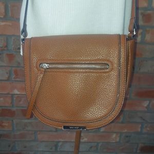 Crossbody bag,NEW, fits I-phone inside and the pouch on back of the bag.